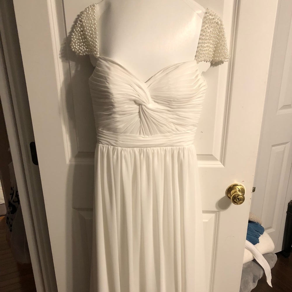 White floor length dress with pearl sleeves